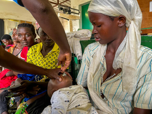 A nurse administers malaria treatment to a young child at the MSF-supported Kaburantwa Health Centre in Cibitoke district A nurse administers malaria treatment to a young child at the MSF-supported Kaburantwa Health Centre in Cibitoke district