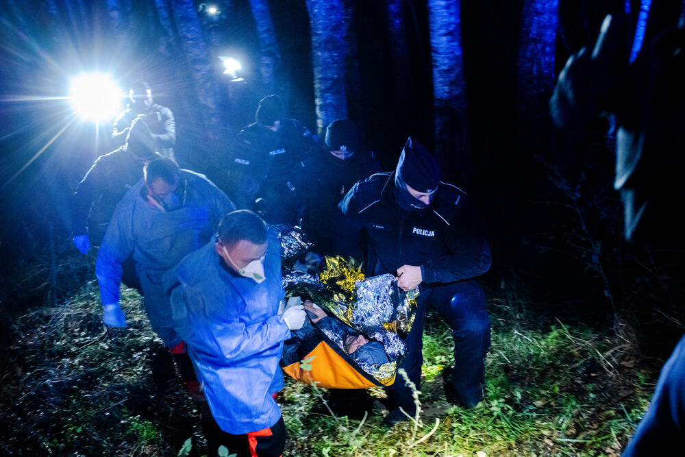 A man from Syria is transported to hospital after being found in a critical condition by Polish aid workers