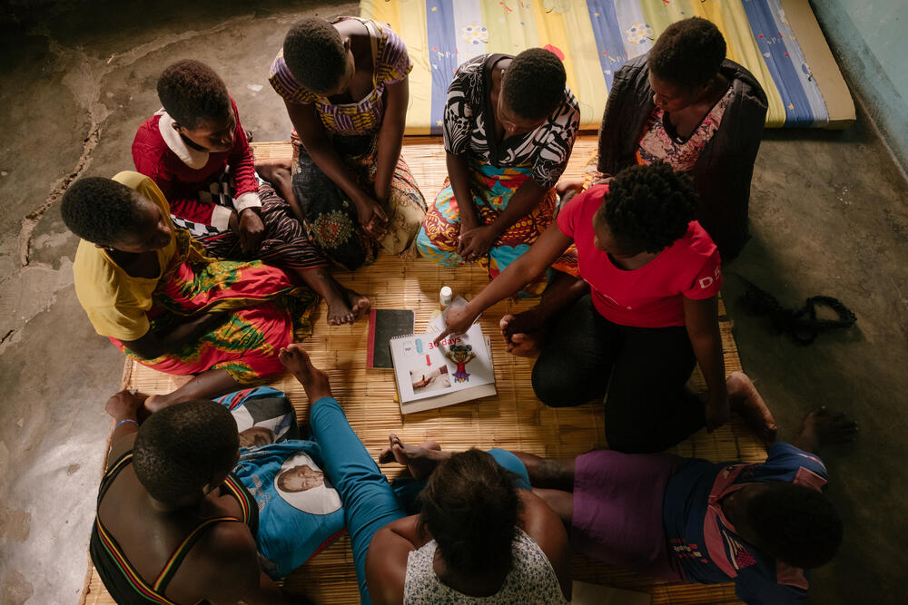 An MSF community health worker conducts a health promotion session with a sex worker community ART group in Nsanje