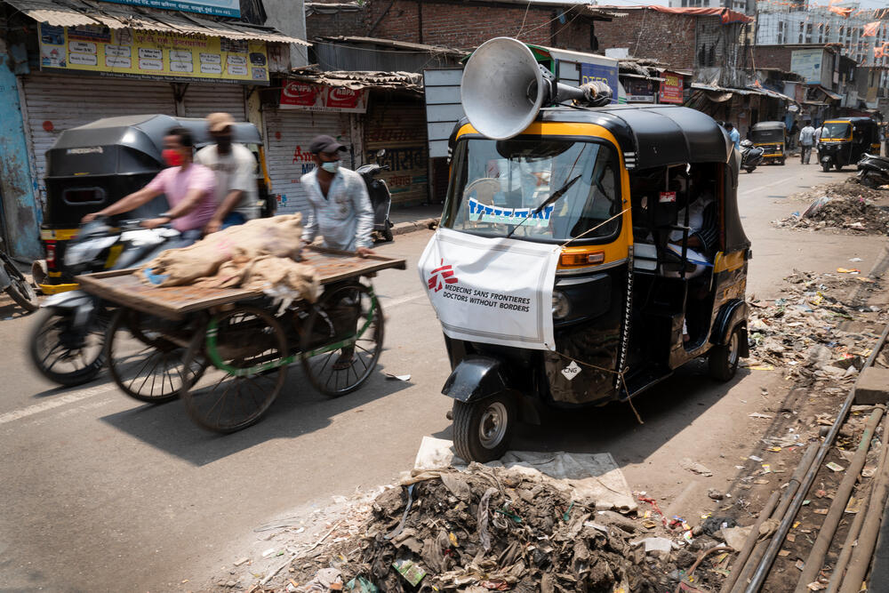 MSF’s health promotion team in Mumbai using a tuk-tuk to spread information about COVID-19