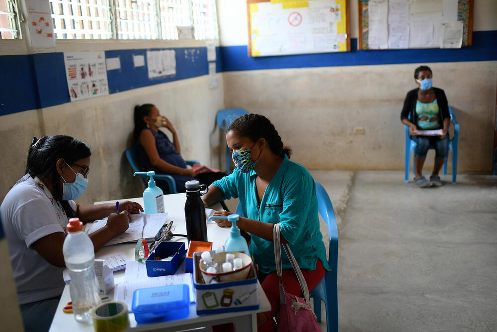 Pregnant women attend prenatal consultations with MSF staff at a remote healthcare post