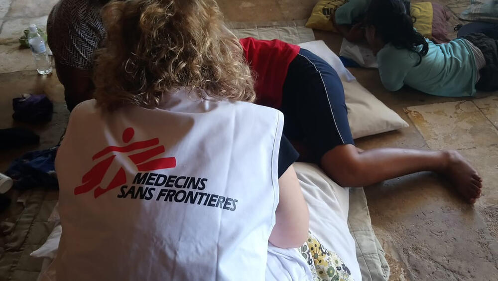 A patient is attended by MSF's mental health team in Nauru in 2018.