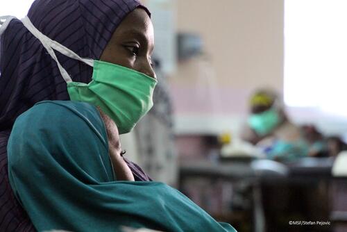 Mother and a child waiting for admission in Gwange hospital Mother and a child waiting for admission in Gwange hospital