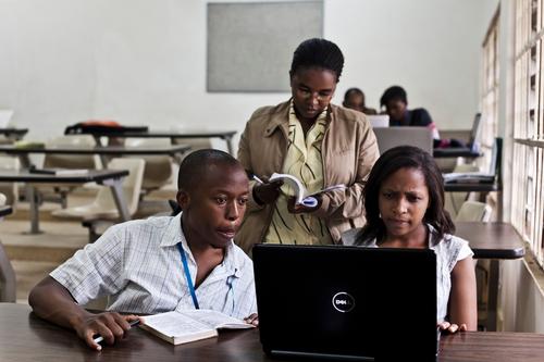 Brown Chiwandira (left) talks through some course work with fellow students at Malamulo College. Brown is attending the college through grants provided by MSF. Malamulo College, Malawi