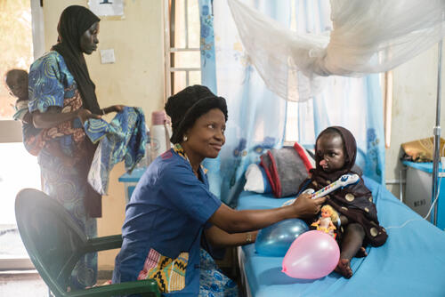 When Yaashe, a six-year-old noma patient from Borno state, and her family arrived at the Sokoto Noma Hospital, they felt isolated because they don’t speak the local language. 

The mental health staff helped them integrate with the other patients. Yaashe fell ill two months after Boko Haram killed her father and her family had to flee their village. 

“Yaashe was a healthy and happy girl, but then suddenly she got a fever and after just three days she developed a hole in her face. When I saw her coming out of surgery, I thanked God. I love her very much" remembers Yagana, Yaashe’s mother. 

Her daughter finally received surgery six months after arriving at the hospital. It’s the first of several operations she needs because of the severity of her injuries. 

Sokoto, Nigeria.
28 October, 2017.