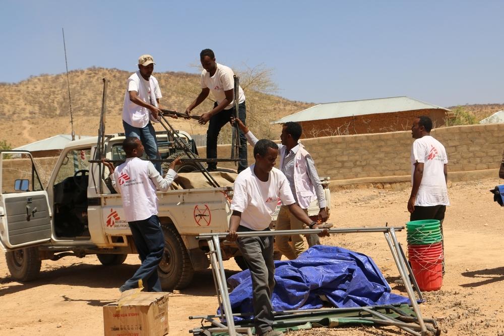 An MSF team off-loads tent materials and other vital goods for a new CTU in Shekosh Woreda 100 Km from Kebridehar town Somali State, Ethiopia.