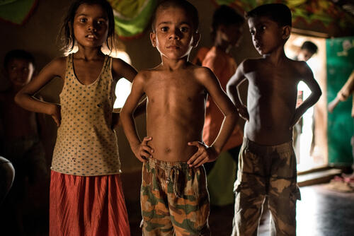 Rohingya children dance at a pre-wedding party in a makeshift refugee camp. Cox’s Bazar District, Bangladesh.