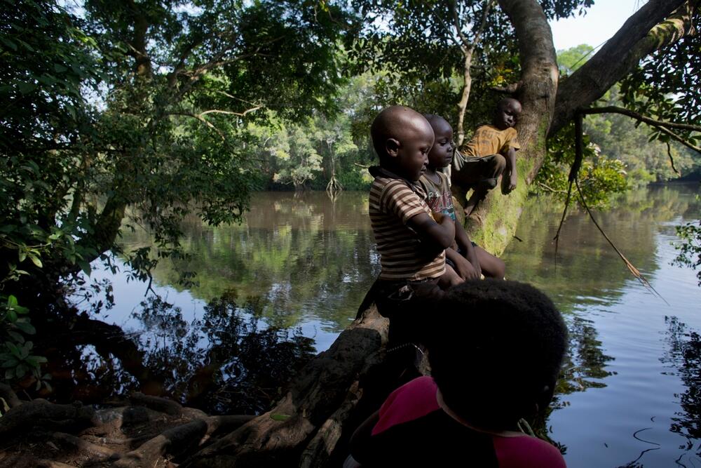 Children playing by the river Bima, in DRC, an area where people are exposed to the tsetse fly