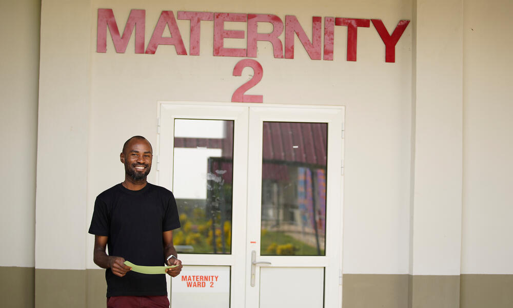 Louis outside a maternity ward at Kenema Hospital