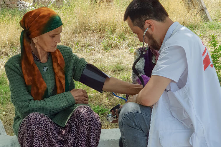 An MSF mobile team treats a woman in the village of Arka, in Leilek district, Batken region, Kyrgyzstan.