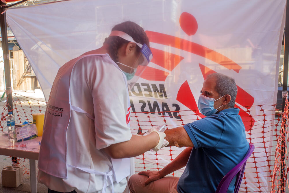 Pierre Badarani is treated for an arm wound at the MSF medical point in the Mar Mikhael neighbourhood of Beirut