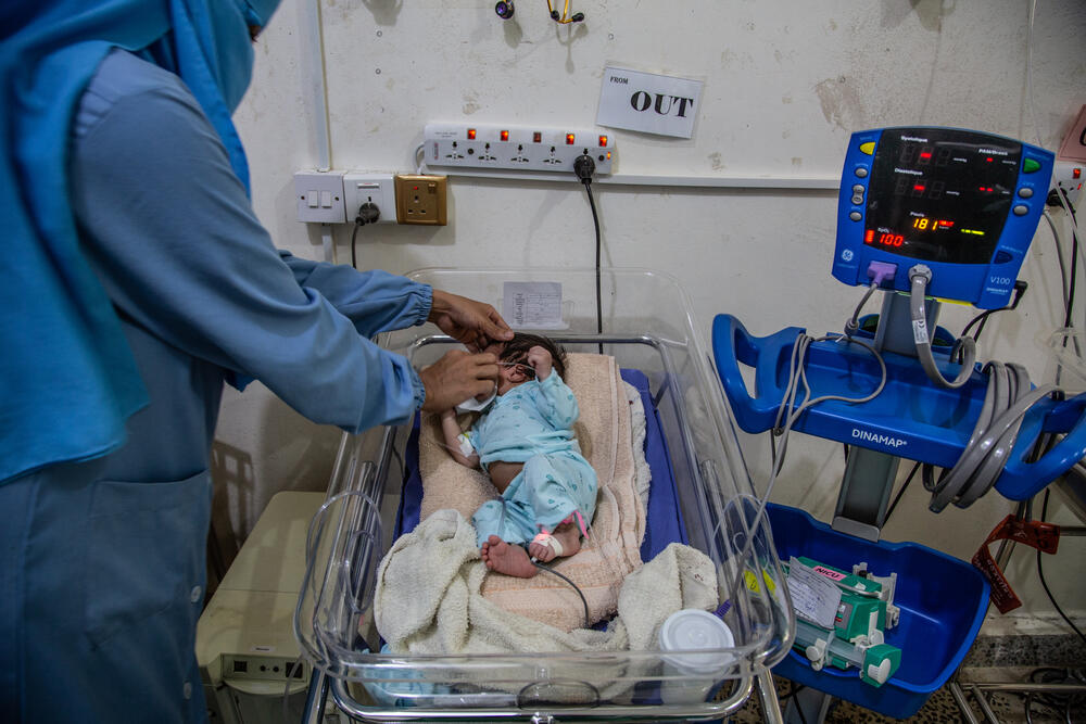 A newborn being treated for respiratory distress at Khamer hospital in Yemen