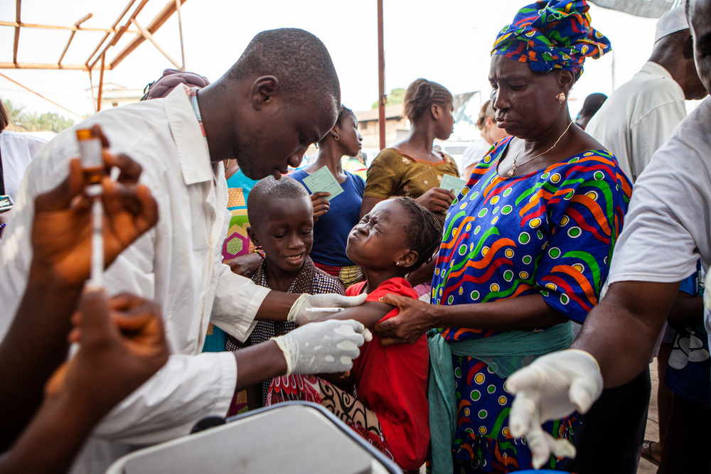 Children are vaccinated during the first day of a measles vaccination programme in Conakry, the capital of Guinea.