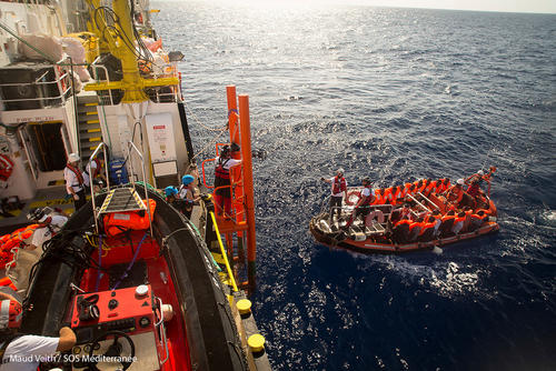 Rescued migrants are safely delivered to the Aquarius after teams rendered assistance to three rubber boats in distress that were overloaded with men, women and children, 1 November 2017.