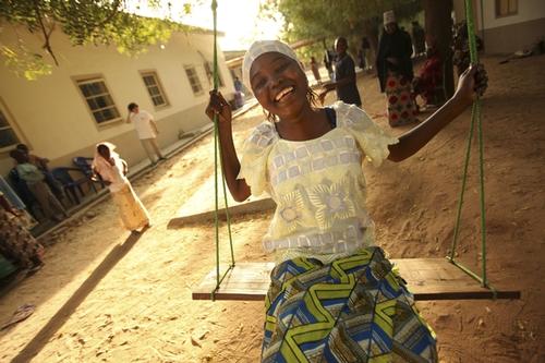 A patient swings outside the fistula ward.