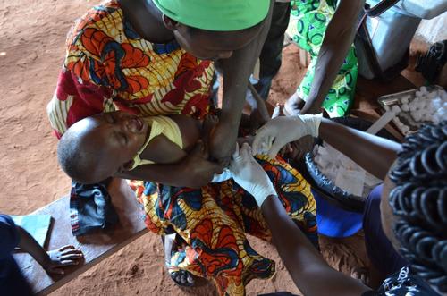 A child is vaccinated with the pneumonia vaccine in Bangassou, Central African Republic, October 2016.