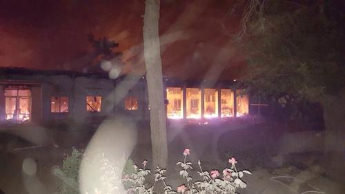 Fires burn in the MSF emergency trauma hospital in Kunduz, Afghanistan, after it was hit and partially destroyed by missiles 03 October 2015.