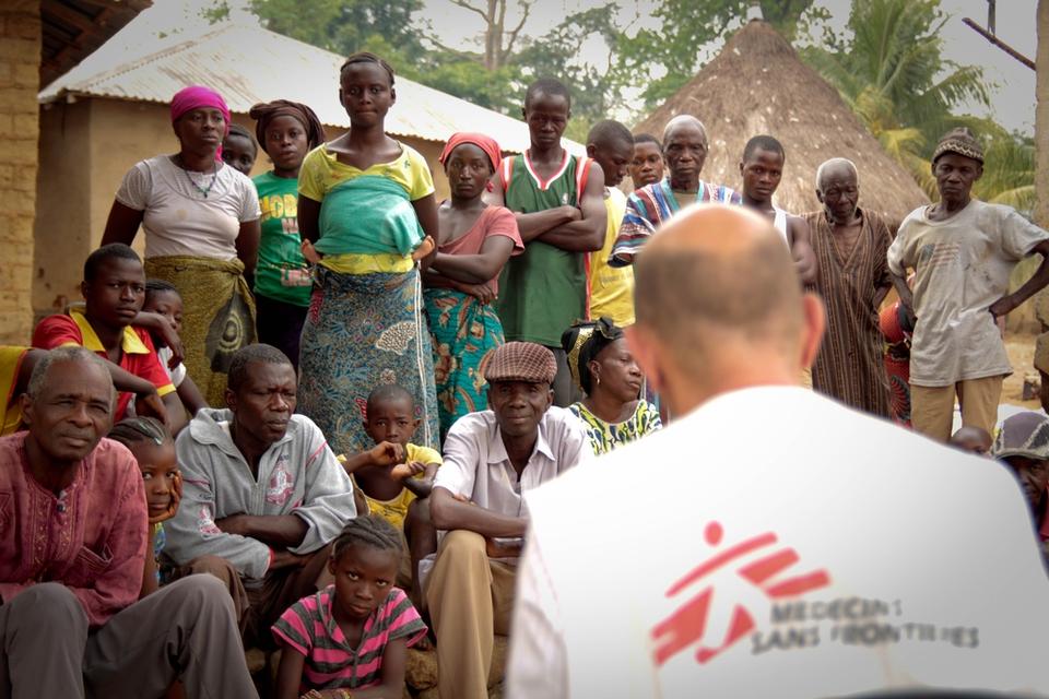 Epidemiologist Michel Van Herp explains to the population in Gbando what is Ebola and how to avoid transmission.