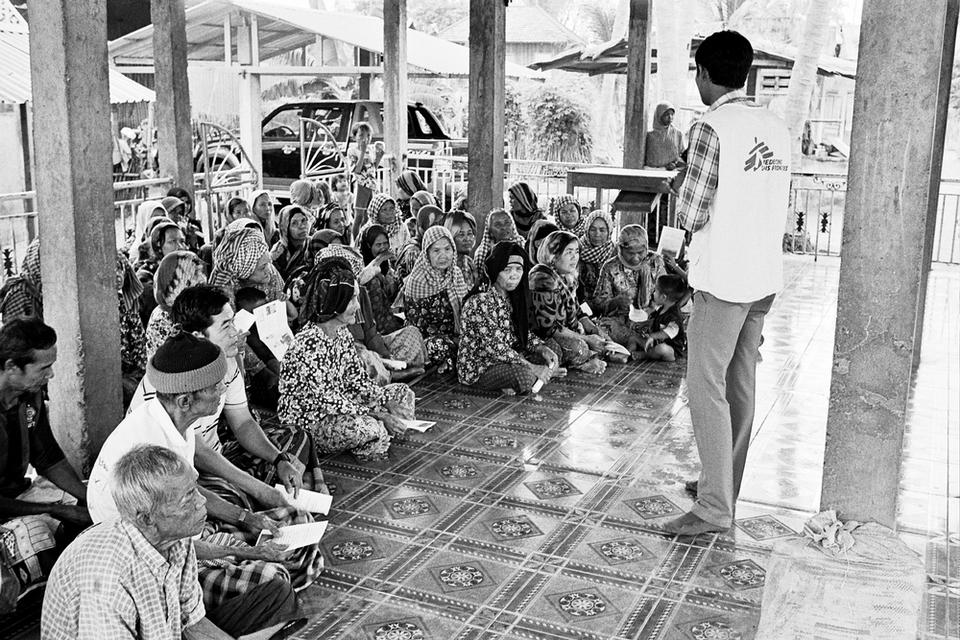 Khen Rith conducts TB health education in Angkor Chea village, Cambodia.